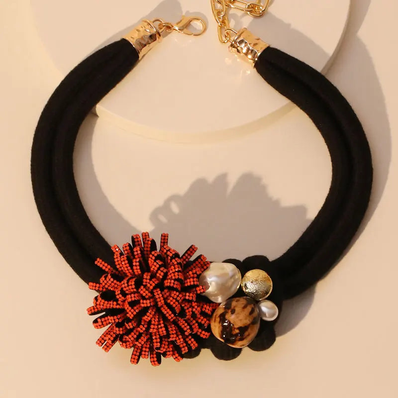 El collar de la llama Ashé