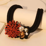 El collar de la llama Ashé