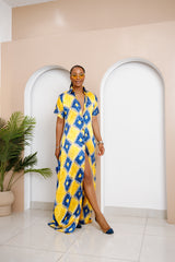 Sophisticated unlined kaftan dress made from traditional silk African Ankara fabric in vibrant multi-color patterns. Perfect for weddings, dinner parties, and formal events. Model height: 5'9".