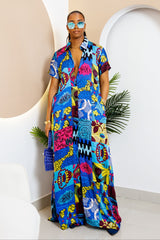 Sophisticated unlined kaftan dress made from traditional silk African Ankara fabric in vibrant multi-color patterns. Perfect for weddings, dinner parties, and formal events. Model height: 5'9".
