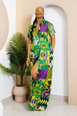 Sophisticated unlined kaftan dress made from traditional silk African Ankara fabric in vibrant multi-color patterns. Perfect for weddings, dinner parties, and formal events. Model height: 5'9".