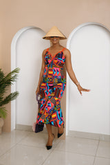 Ola Midi Ankara Dress with Aso-oke straps, structured bust, and mid-length silhouette, designed in the U.S. and handcrafted in Africa.