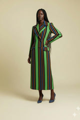 Model wearing Omenka French-style Aso Oke coat with bold green, blue, and brown stripes, double-breasted design, and structured silhouette.