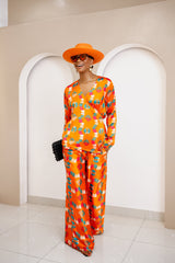 Conjunto de top cruzado y pantalón palazzo de seda Ankara en color naranja vibrante de Omugwo