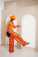 Conjunto de top cruzado y pantalón palazzo de seda Ankara en color naranja vibrante de Omugwo