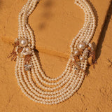 El collar de la corona y la perla