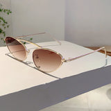 Chic Cat-Eye Metal Sunglasses - Triangle Decor & UV400 Protection