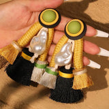 Pendientes colgantes con múltiples borlas Makeda