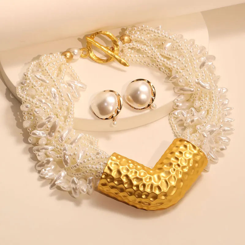 Collar con el escudo de la reina