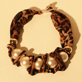 El collar de la musa Mzuri