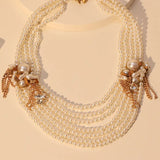 El collar de la corona y la perla