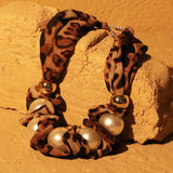 El collar de la musa Mzuri