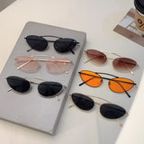 Chic Cat-Eye Metal Sunglasses - Triangle Decor & UV400 Protection