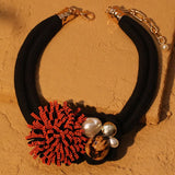El collar de la llama Ashé