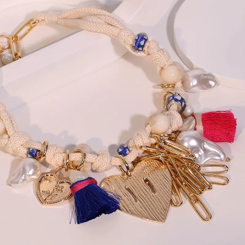 El collar de dijes Oríkì