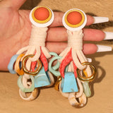Los pendientes de hilo Zola