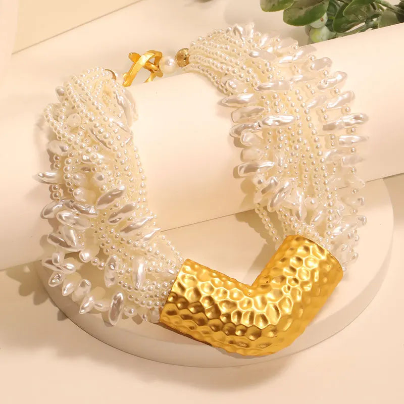 Collar con el escudo de la reina