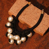El collar Noir Orb