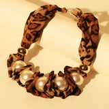 El collar de la musa Mzuri