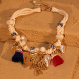 El collar de dijes Oríkì