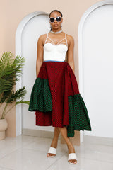 Model wearing Ankara Skirt made from red and green Ankara fabrics