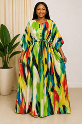 Umuoma multicolored crepe floor-length kaftan dress featuring wide 3/4 kimono sleeves, round neckline, button-front placket, adjustable drawstring waist, and flowing maxi silhouette.