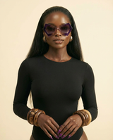 Butterfly Cat Eye Sunglasses: Gradient UV400 Candy Shades - chest-up portrait crop from mid-chest to just above the head, model facing camera, sunglasses are the PRIMARY FOCAL POINT and must be tack-sharp and clearly visible on the model's face, soft confident expression, shallow depth of field with sunglasses in razor-sharp focus