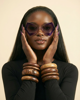 Butterfly Cat Eye Sunglasses: Gradient UV400 Candy Shades - chest-up portrait crop from mid-chest to just above the head, model facing camera, sunglasses are the PRIMARY FOCAL POINT and must be tack-sharp and clearly visible on the model's face, soft confident expression, shallow depth of field with sunglasses in razor-sharp focus