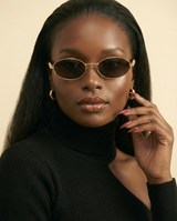 Luxury Oval Y2K Sunglasses | Women's Metal Frame UV400 Shades - front-facing view