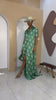 Sophisticated unlined kaftan dress crafted from traditional silk African Ankara fabric in vibrant multi-color prints, featuring a buttoned-front design. Perfect for weddings, dinner parties, and formal events. Model is 5'9".