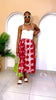 Model wearing Egbebelu Adire Skirt made from red and green hand-dyed Nigerian fabrics