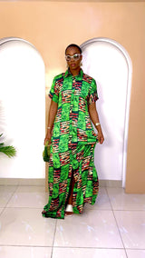 Sophisticated unlined kaftan dress made from traditional silk African Ankara fabric in vibrant multi-color patterns. Perfect for weddings, dinner parties, and formal events. Model height: 5'9".